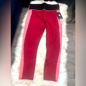 Four Laps Leggings! So soft, side pockets. Size L